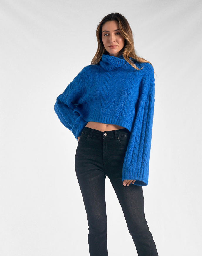 electric blue turtleneck sweater
